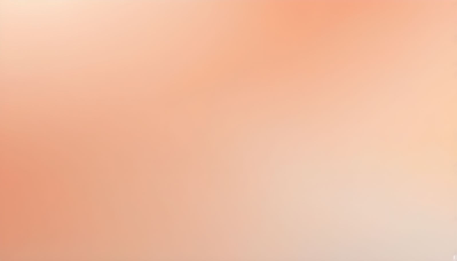 A soft gradient from peach into cream in soft morning light