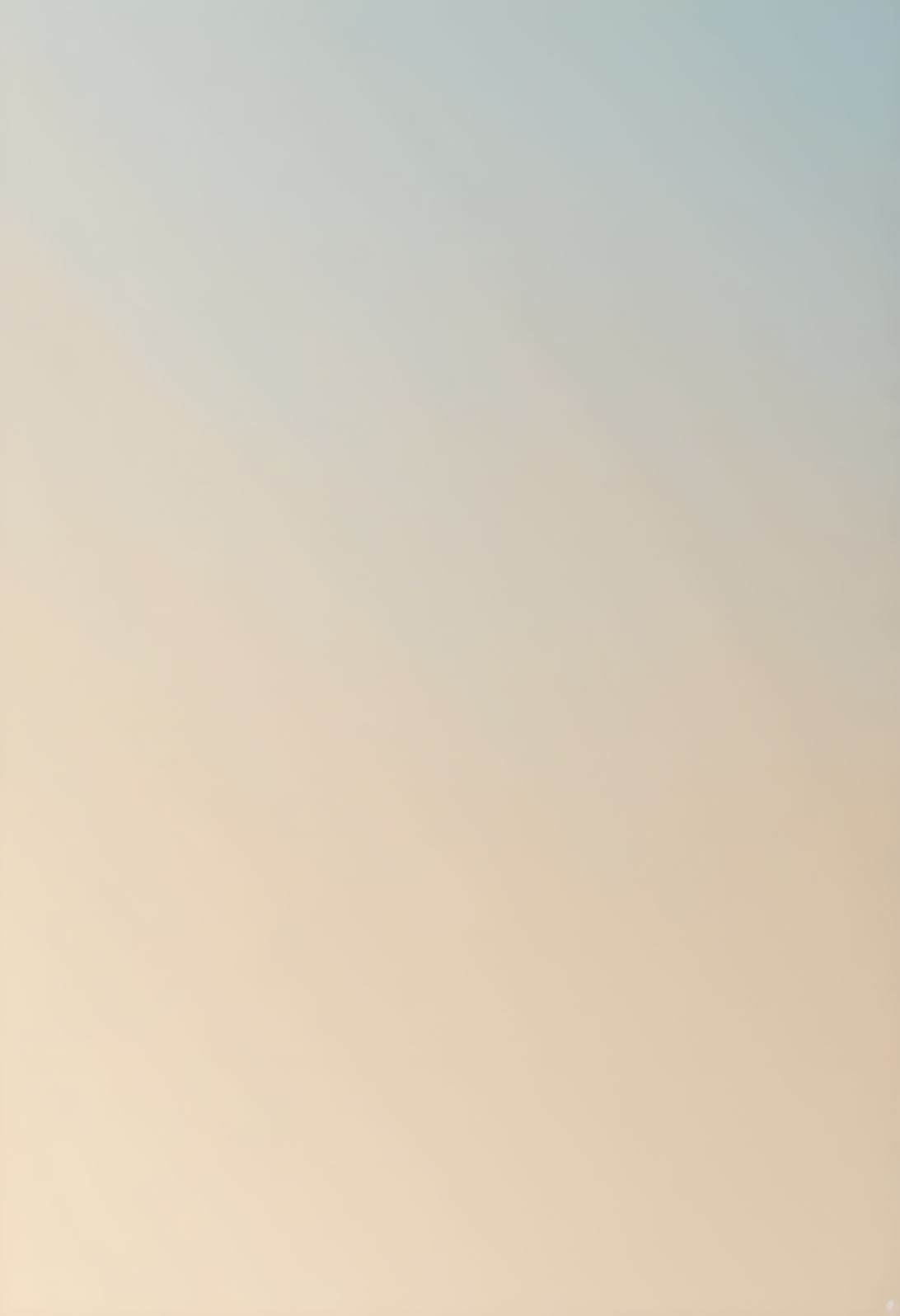 A pale sky gradient fading from soft blue into warm cream