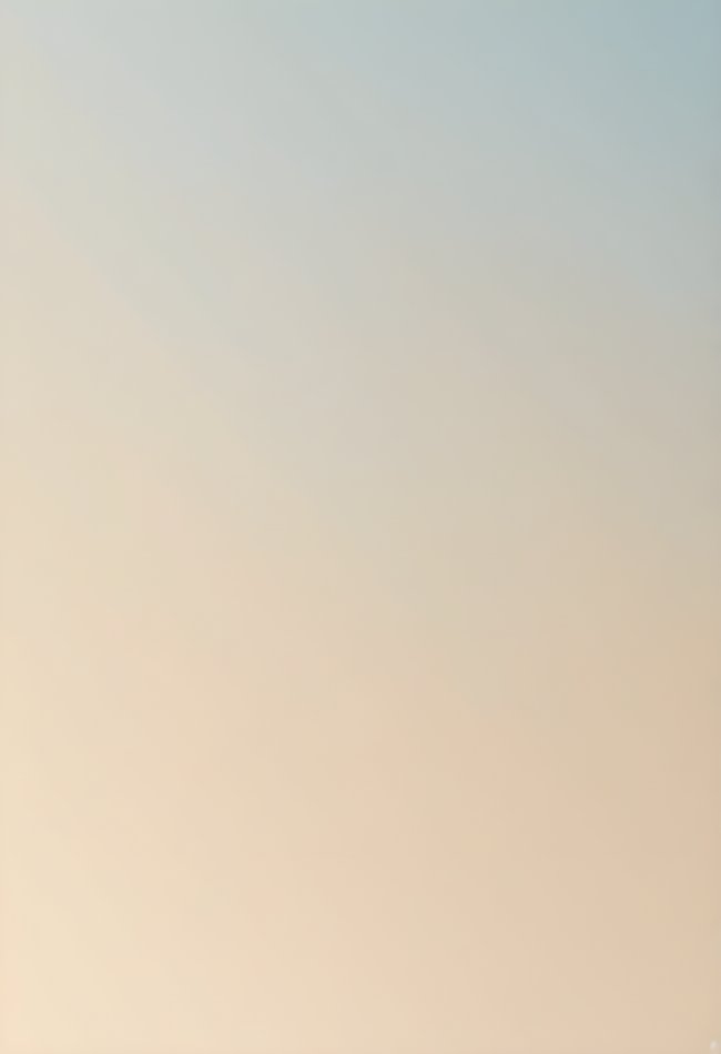 A pale sky gradient fading from soft blue into warm cream